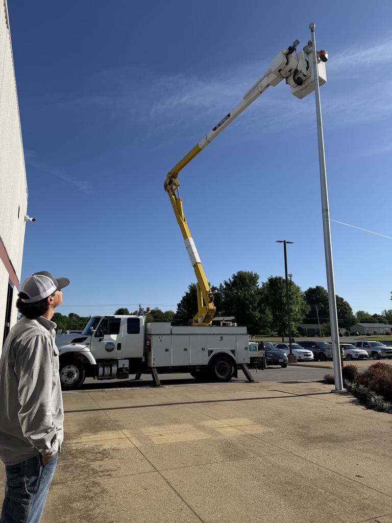 Carroll COunty electric fixing our flag pole 