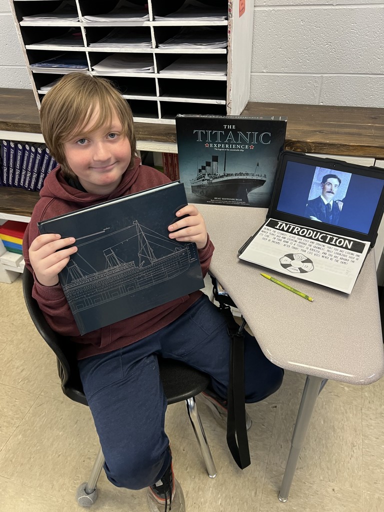 west carroll student shows research material for titanic project for ela class