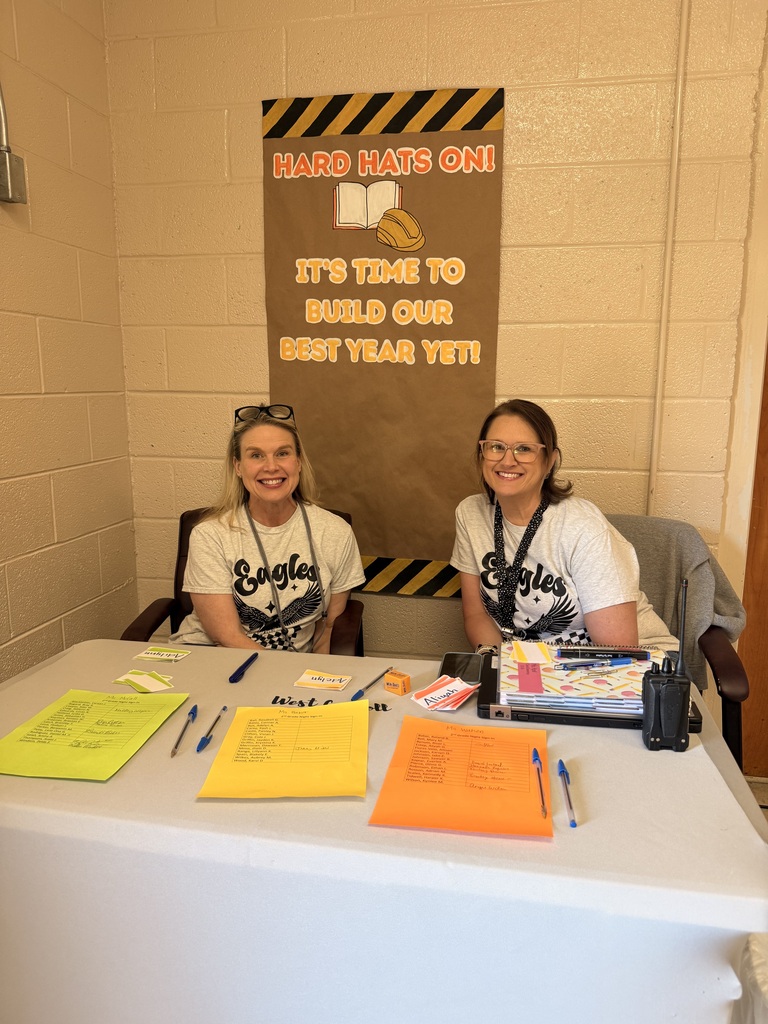 related services teachers welcomed students as they entered.