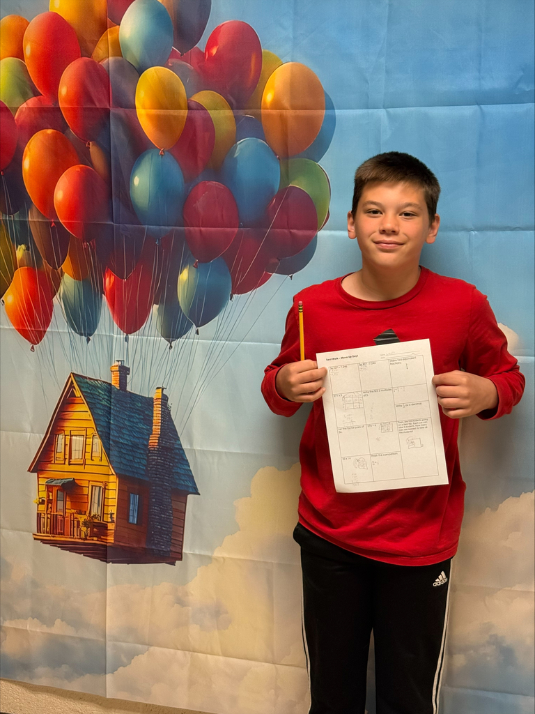 west carroll elementary student as she particpates in Move Up day in decorated hallway