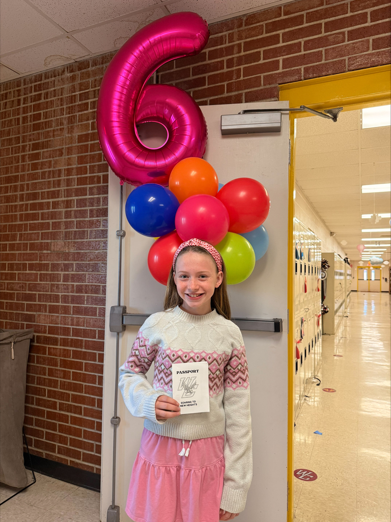 west carroll elementary student as she particpates in Move Up day in decorated hallway