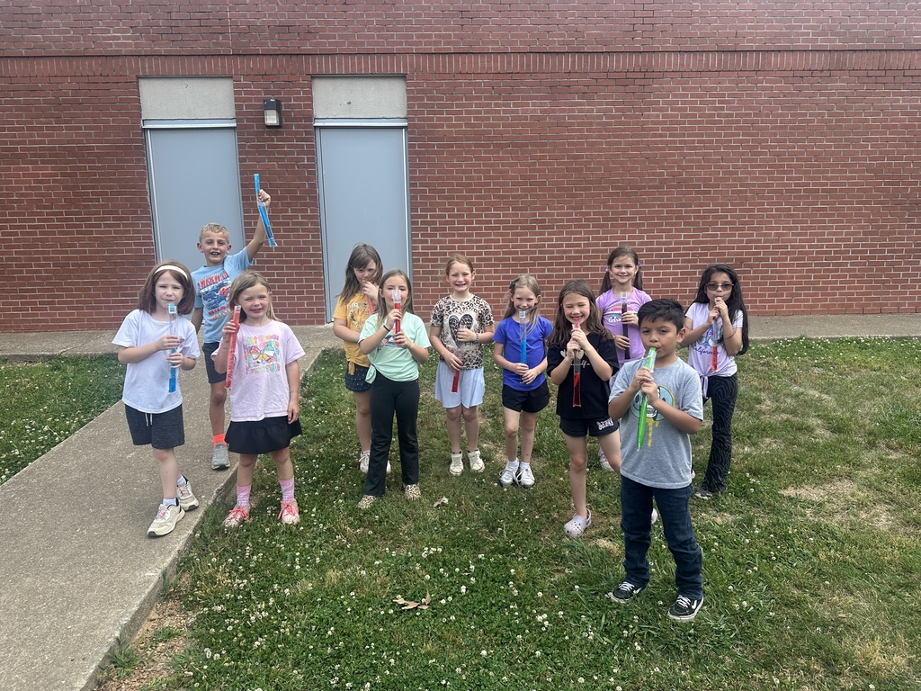 West Carroll Primary students are rewarded with treats outside  after meeting the sight word challenge