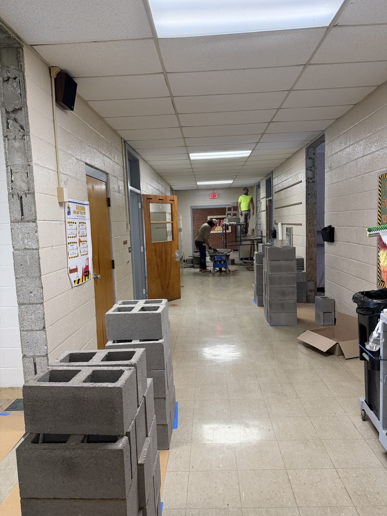 Hallway construction at west carroll elementary school, workers and materials
