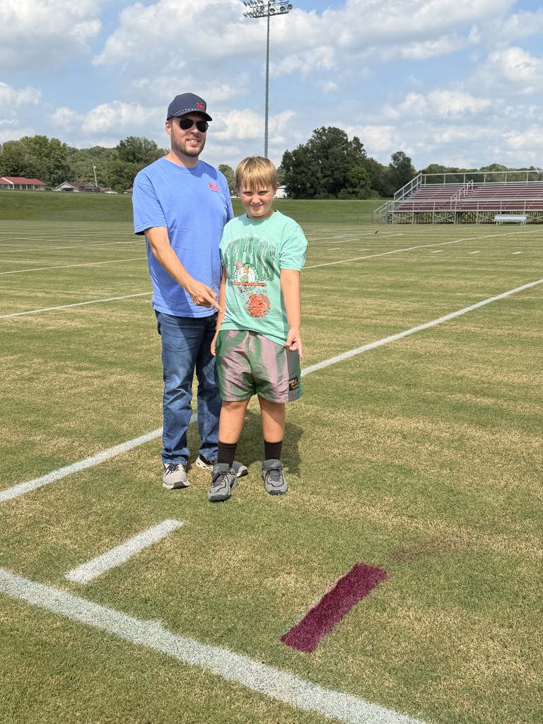 Daniel and Jay Cruz Rogers at the Football field 