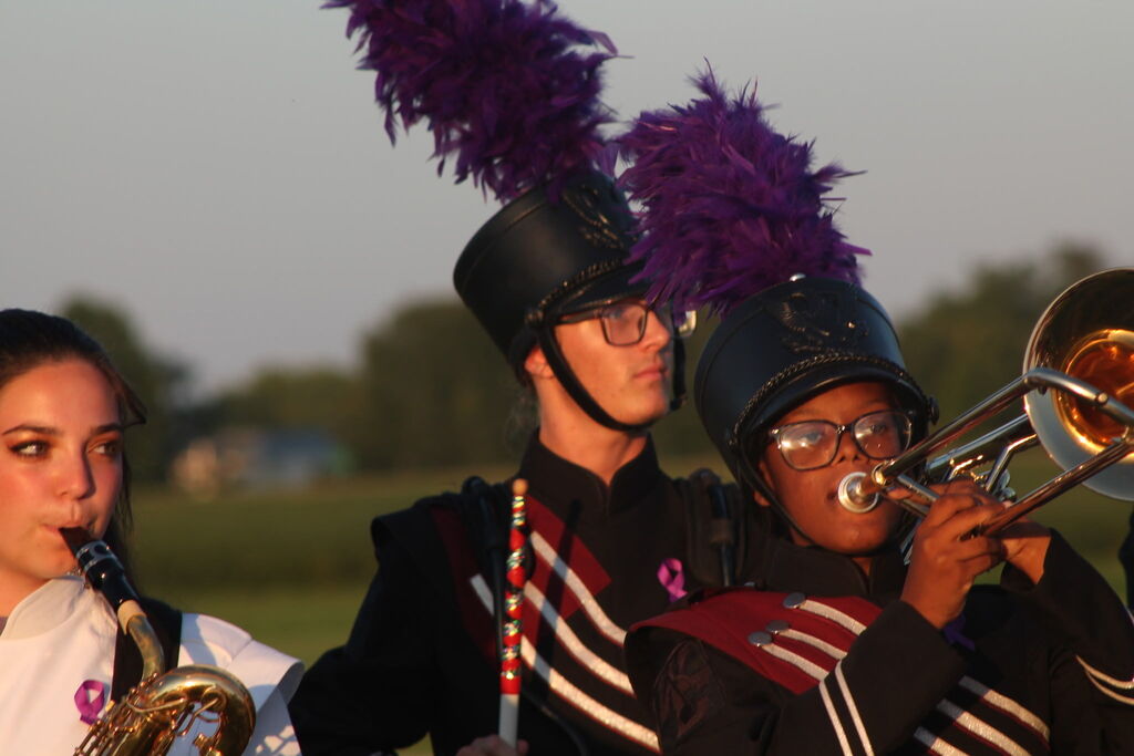 West Carroll marching band members, cheerleaders, and football players wear purple accents during Friday night’s game in support of Mrs. Pam “Nan” Inman, a longtime band supporter who is currently battling cancer. The War Eagle community wore purple in place of its traditional maroon to show support for Nan and her fight.