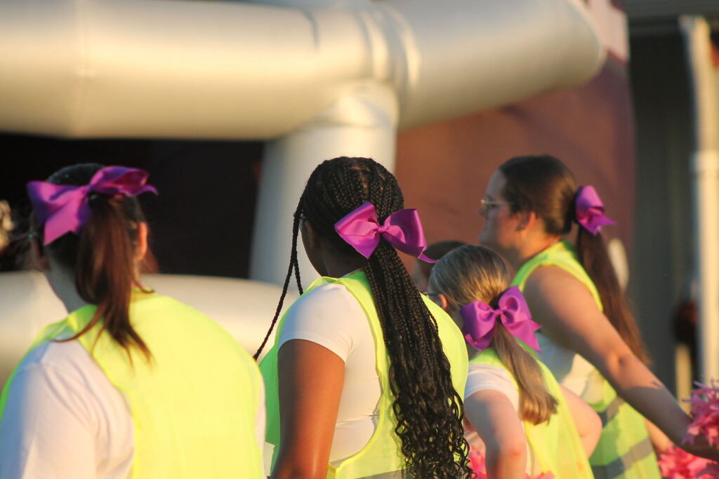 West Carroll marching band members, cheerleaders, and football players wear purple accents during Friday night’s game in support of Mrs. Pam “Nan” Inman, a longtime band supporter who is currently battling cancer. The War Eagle community wore purple in place of its traditional maroon to show support for Nan and her fight.
