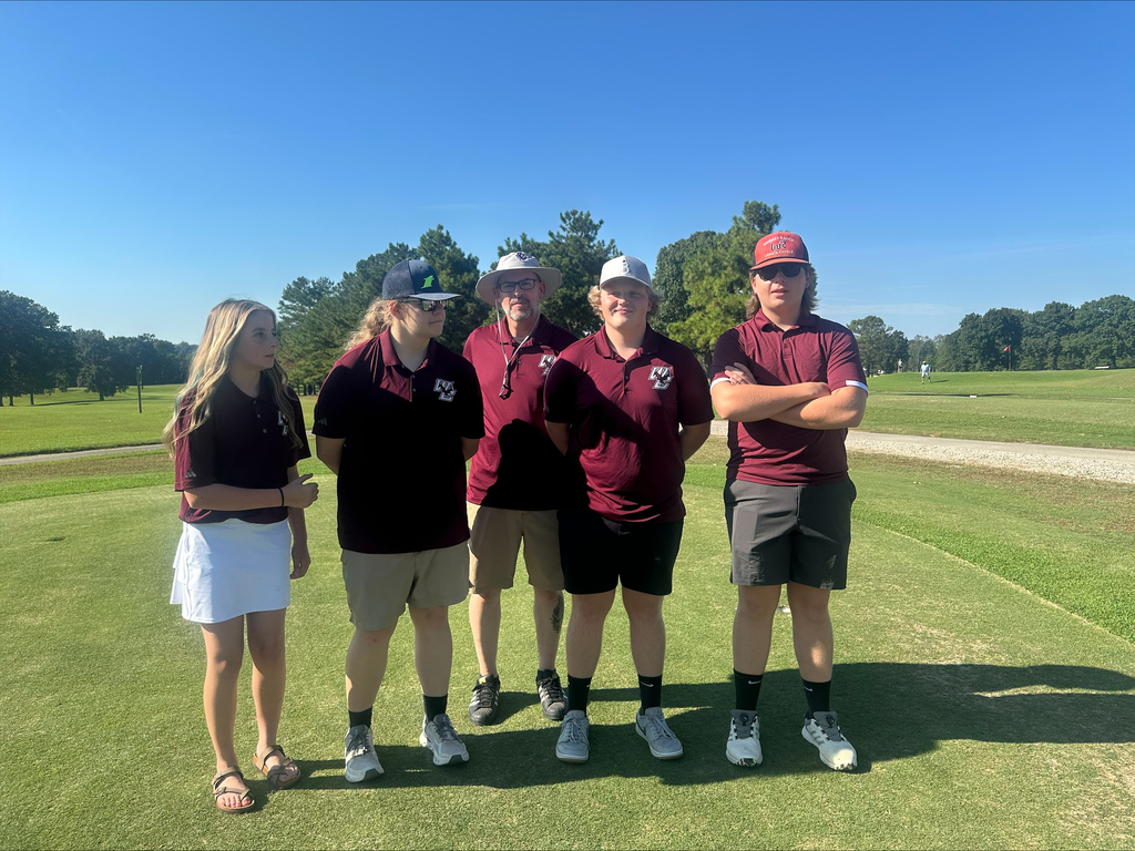 wchs golf team before match standing on greens