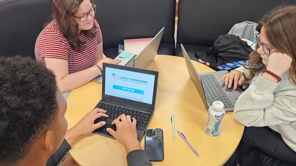 West Carroll seniors sit together at classroom tables using laptops to access the Tennessee Direct Admissions and THEC Student Portal websites as they explore their college admission opportunities.