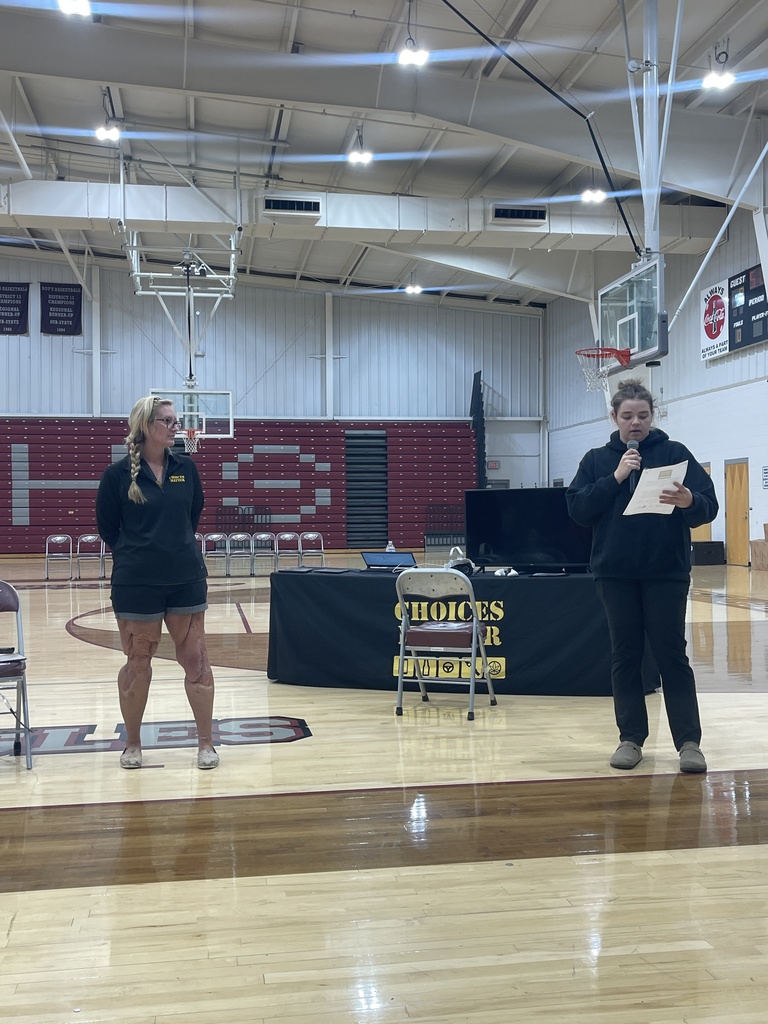 A West Carroll student speaks during the Choices Matter program while guest speaker Brittany Leedham listens nearby in the West Carroll gym.