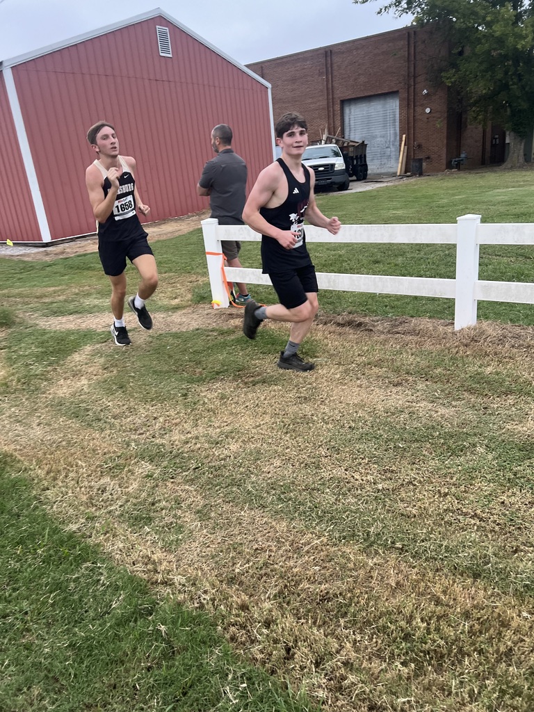west carroll student competing at cross country meet