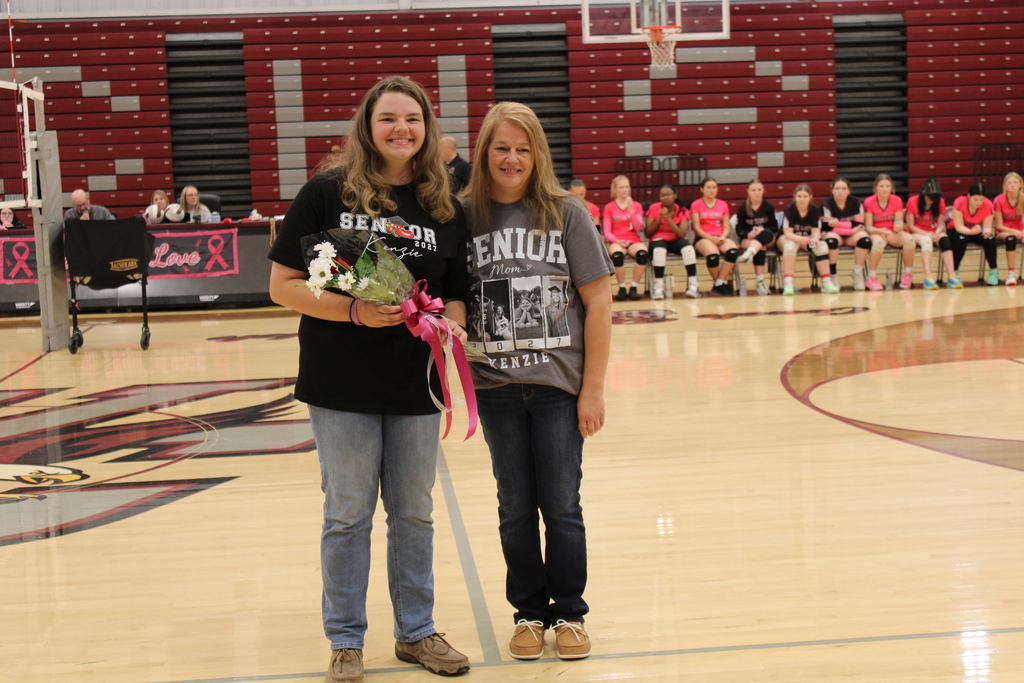 A West Carroll senior athlete stands with family members on the court during Senior Night festivities.