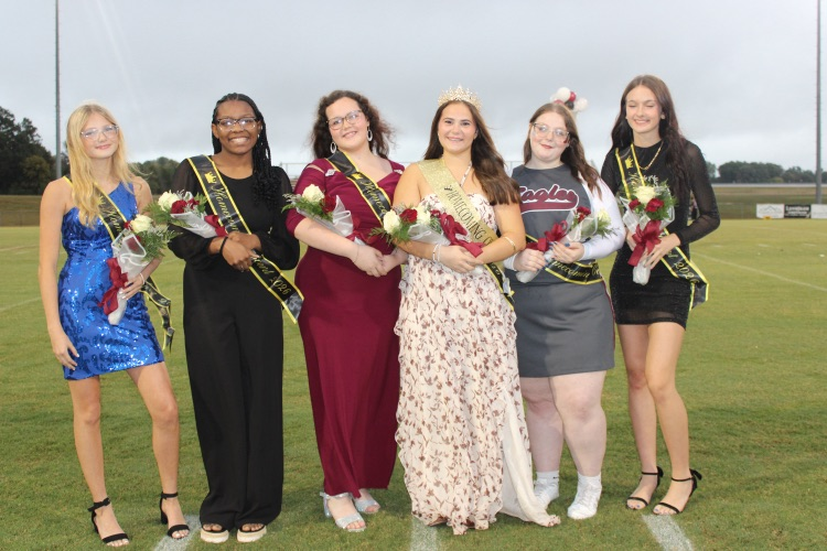 Homecoming Court: Members of the 2026 West Carroll Football Homecoming Court pose together on the football field following the crowning ceremony.