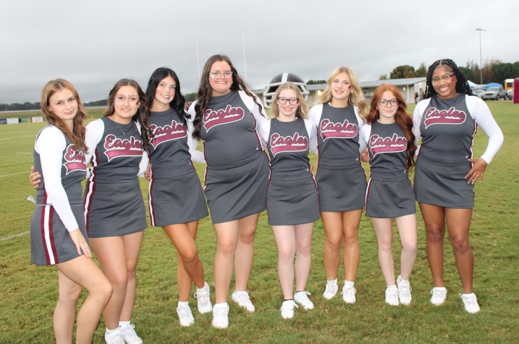 West Carroll Cheerleaders: West Carroll cheerleaders pose together on the football field during the 2026 Football Homecoming festivities.
