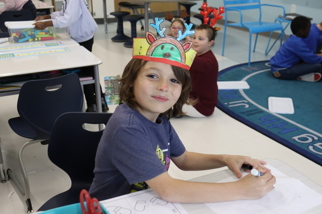 Student with reindeer hat