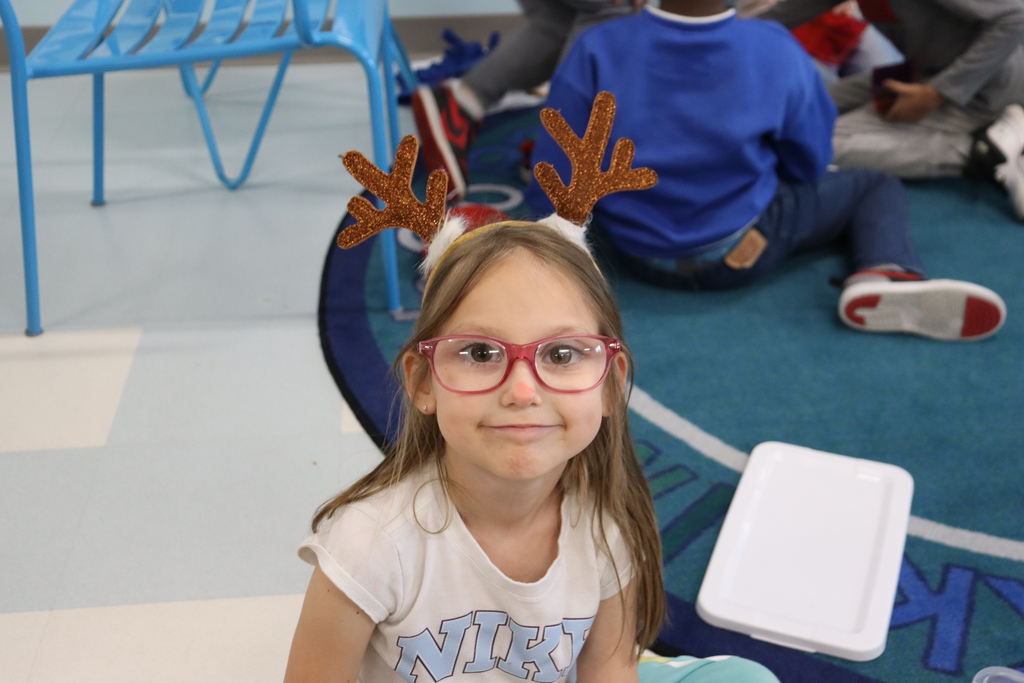 Student with reindeer hat