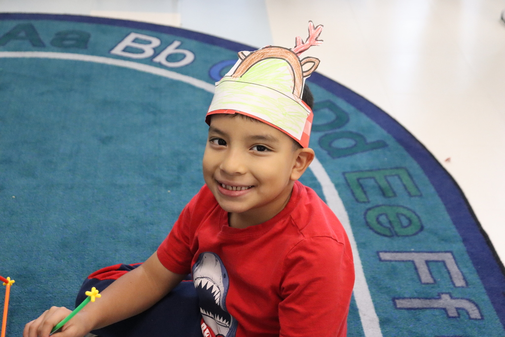 Student with reindeer hat
