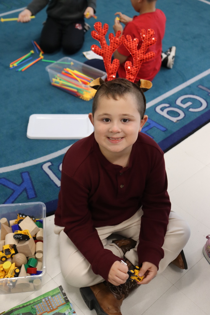 Student with reindeer hat