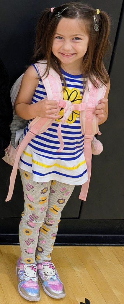 Girl with different colored hair ties