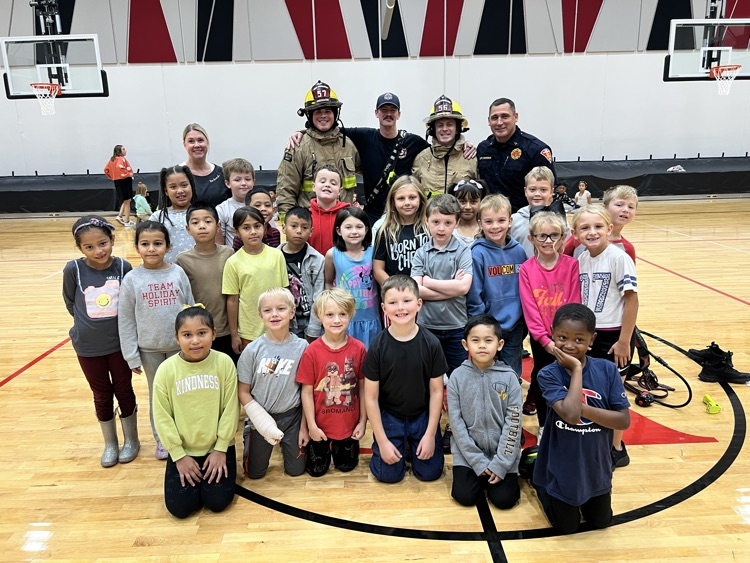 kids with firefighters