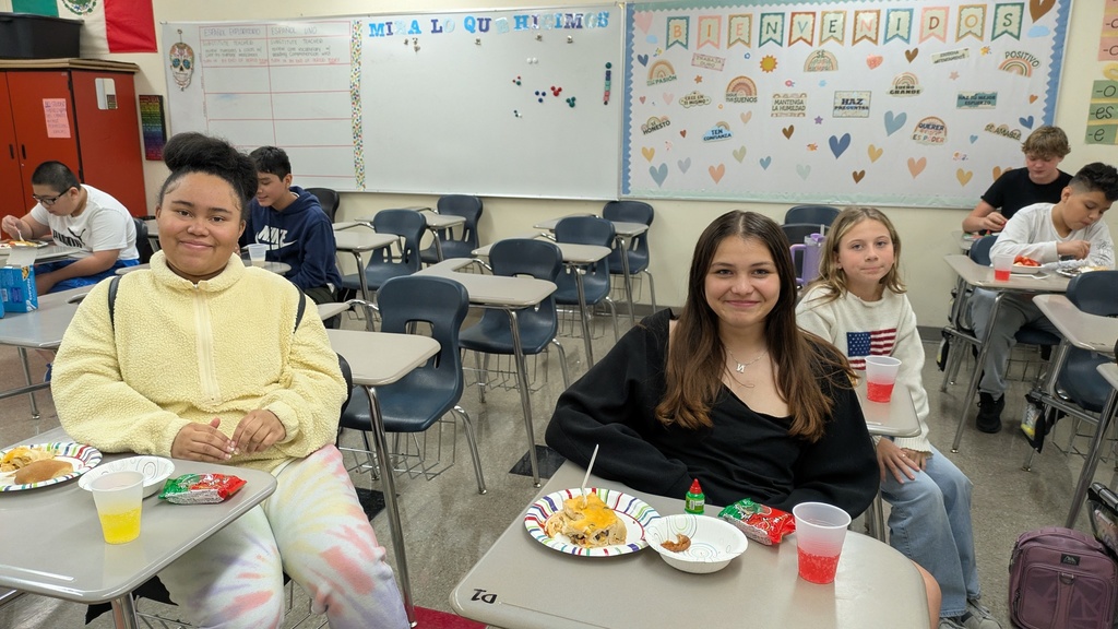 students eating at their desk
