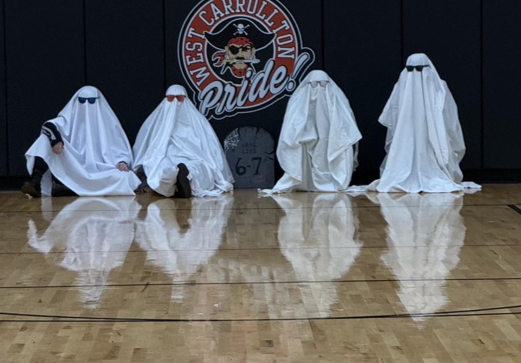people in ghost outfits