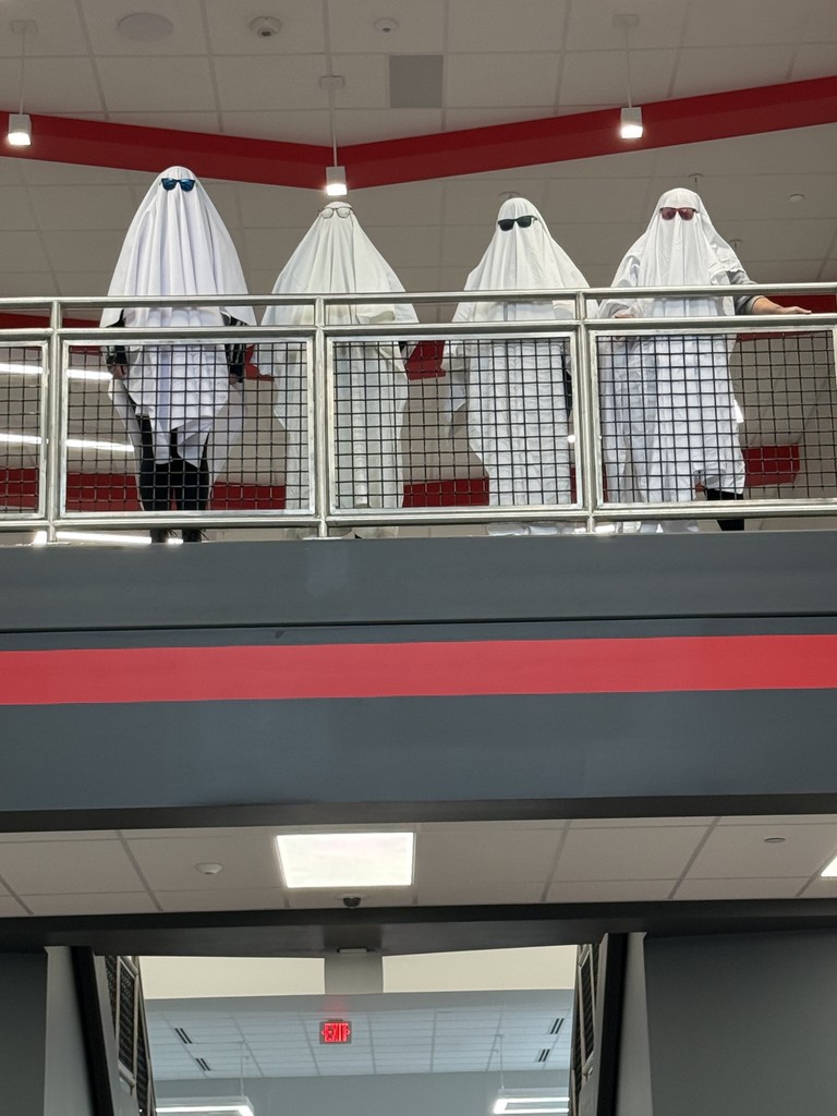 people in ghost outfits