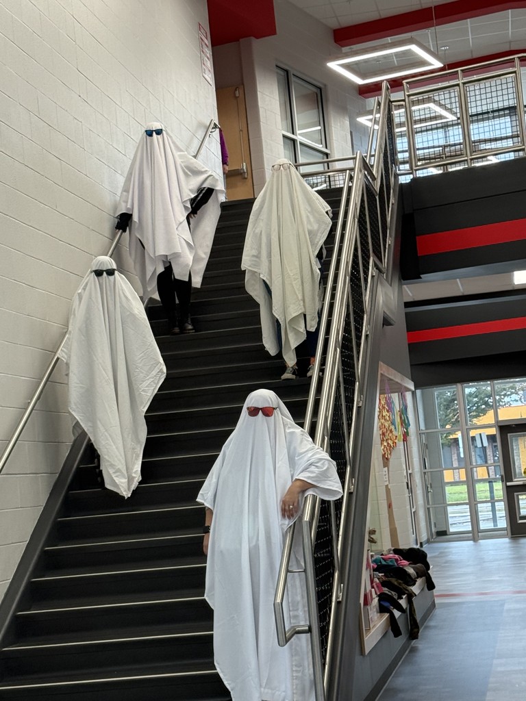 people in ghost outfits