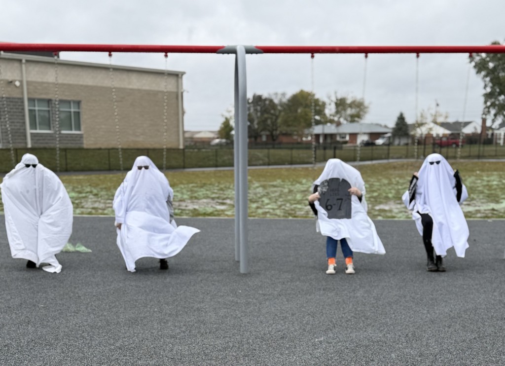 people in ghost outfits