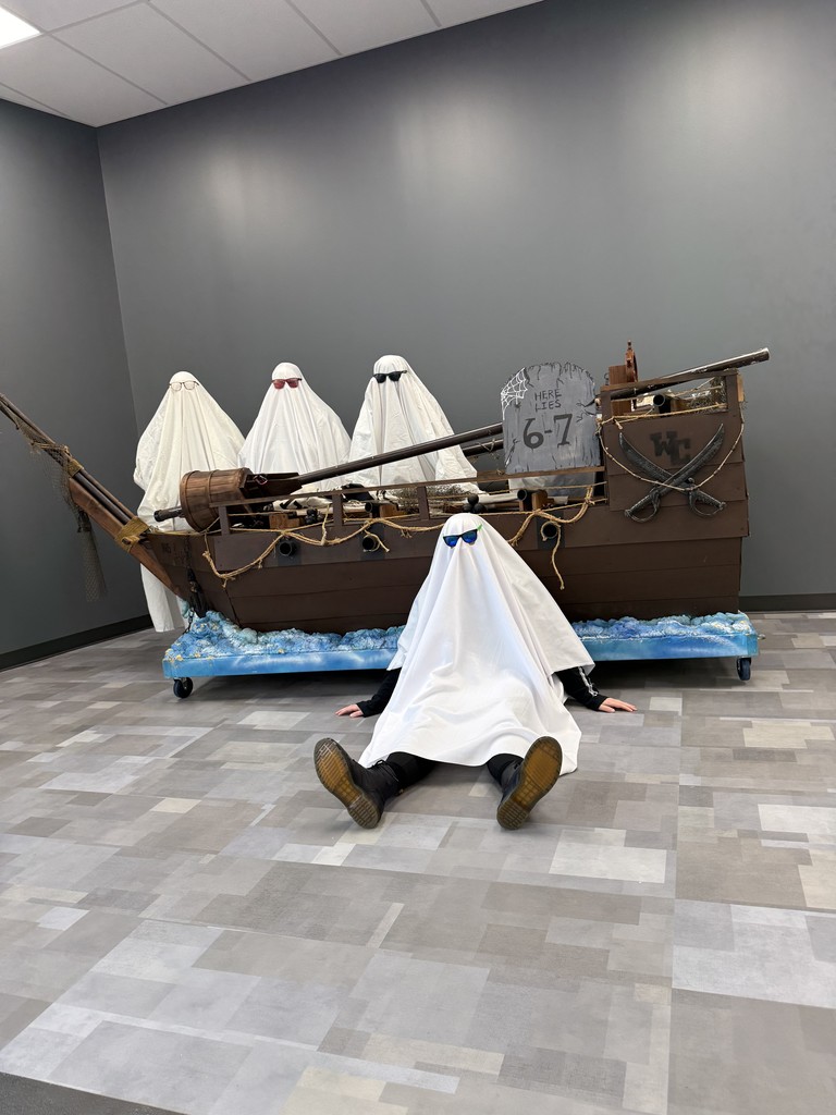 people in ghost outfits