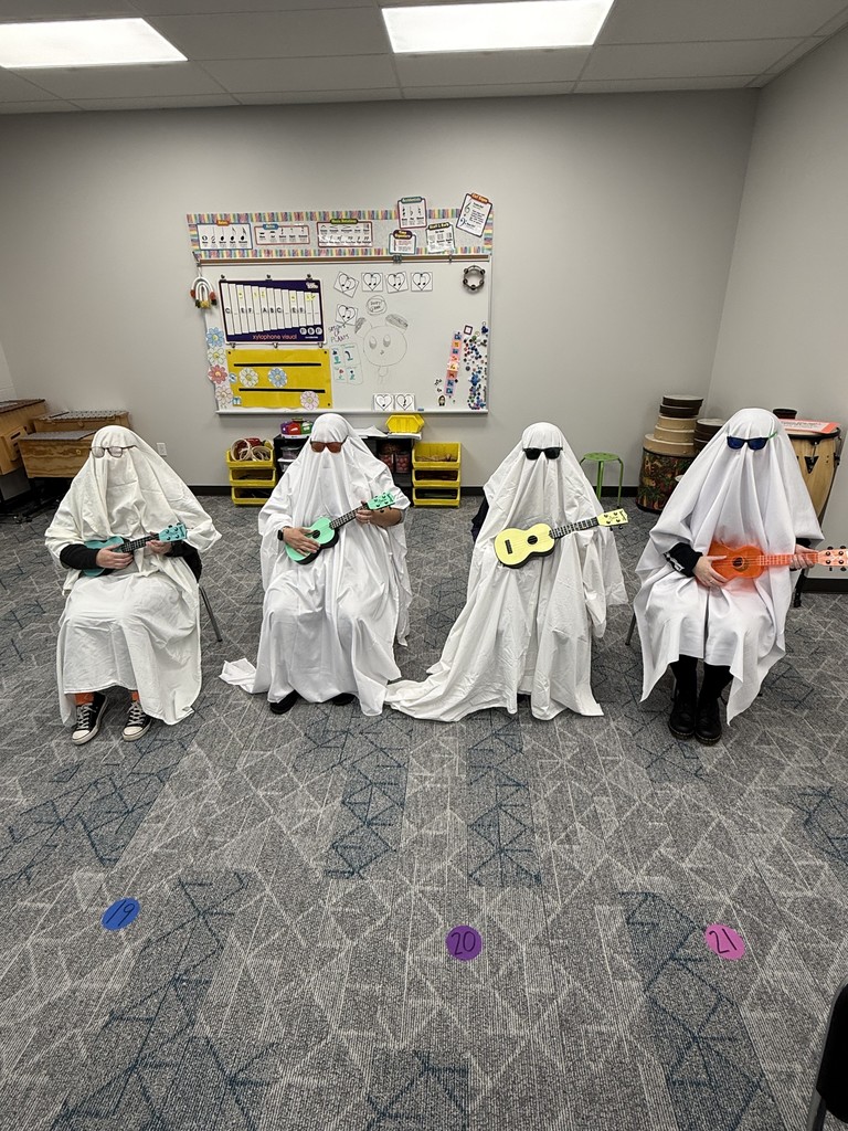 people in ghost outfits