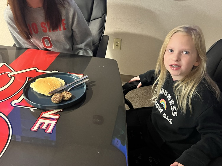 girl eating breakfast