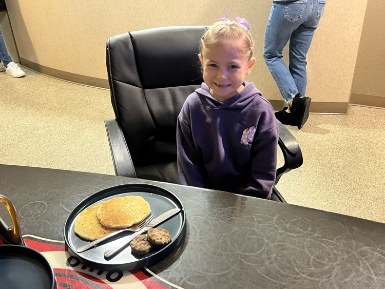 girl eating breakfast