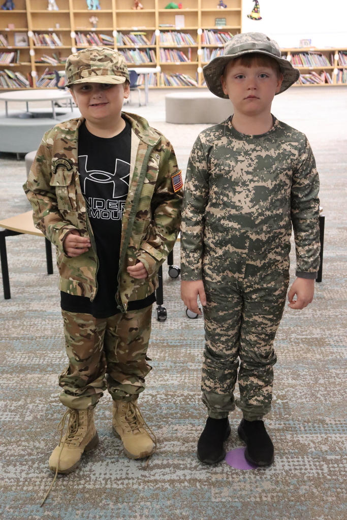 2 boys in military costumes