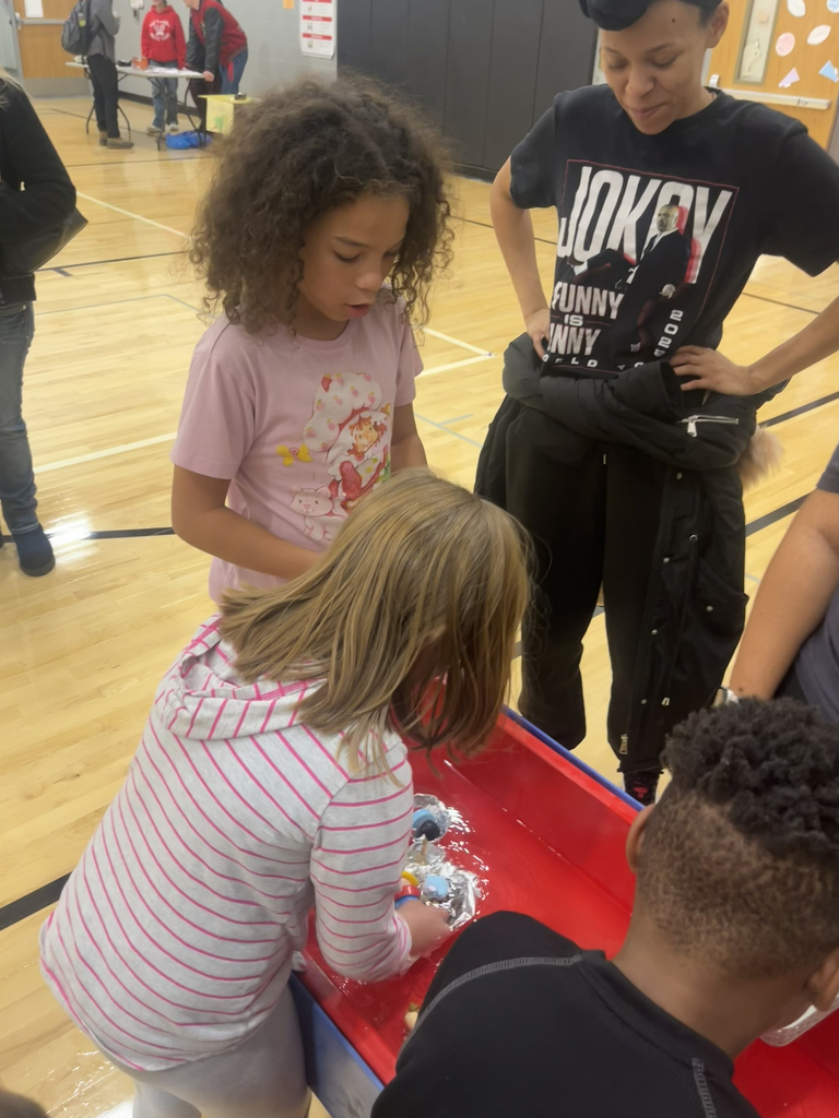 children doing an activity at STEAM Night