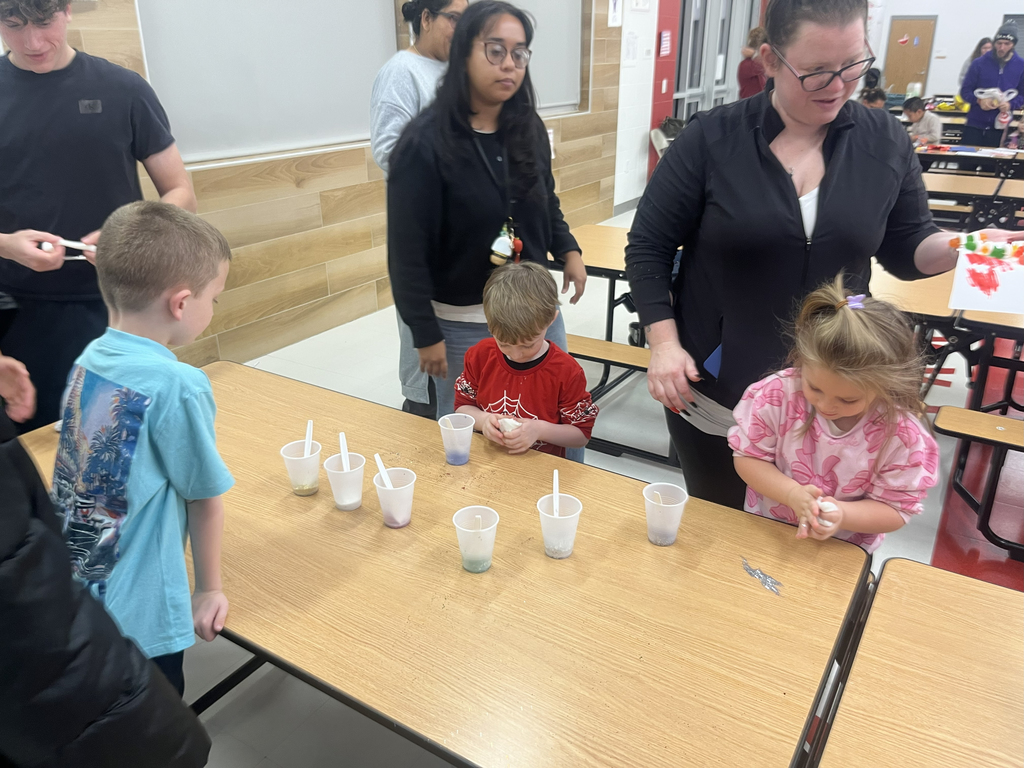 children participating in a STEAM Night activity