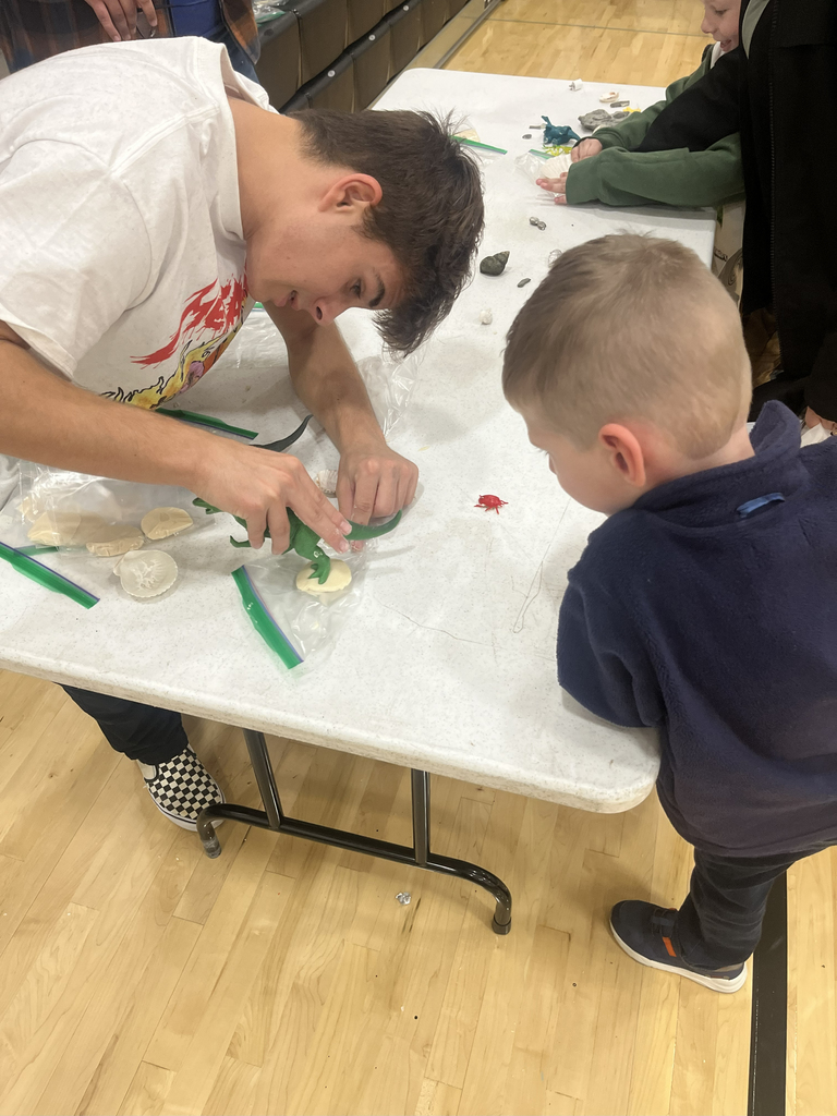 two boys doing a STEAM Night activity