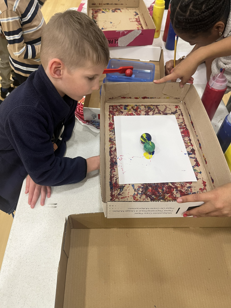 child looking at an exhibit