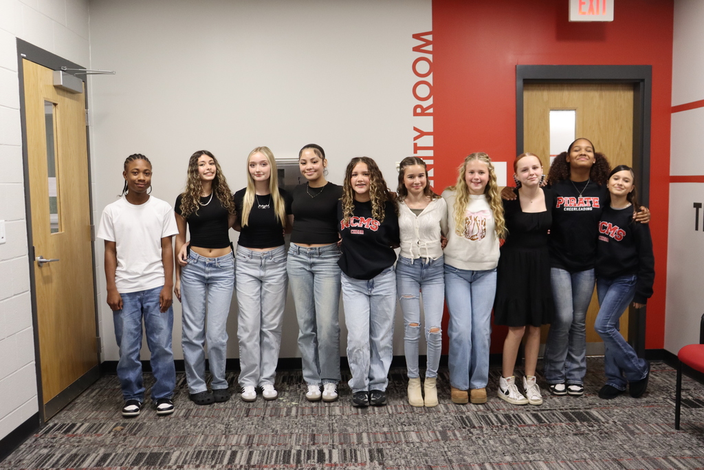 Students making a presentation at the school board meeting