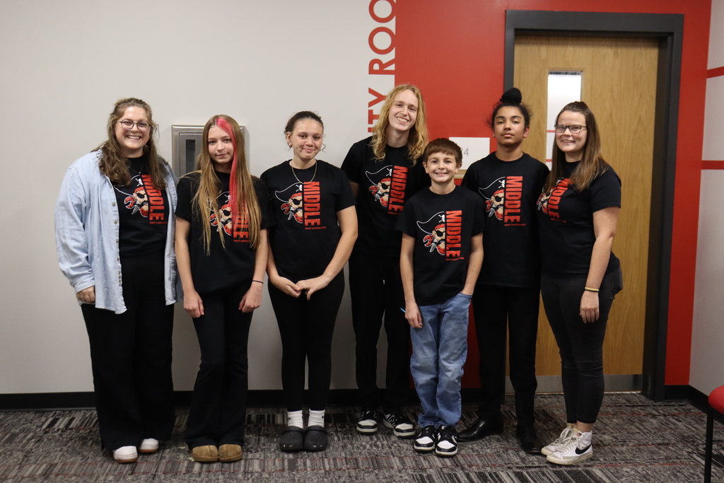 Students making a presentation at the school board meeting