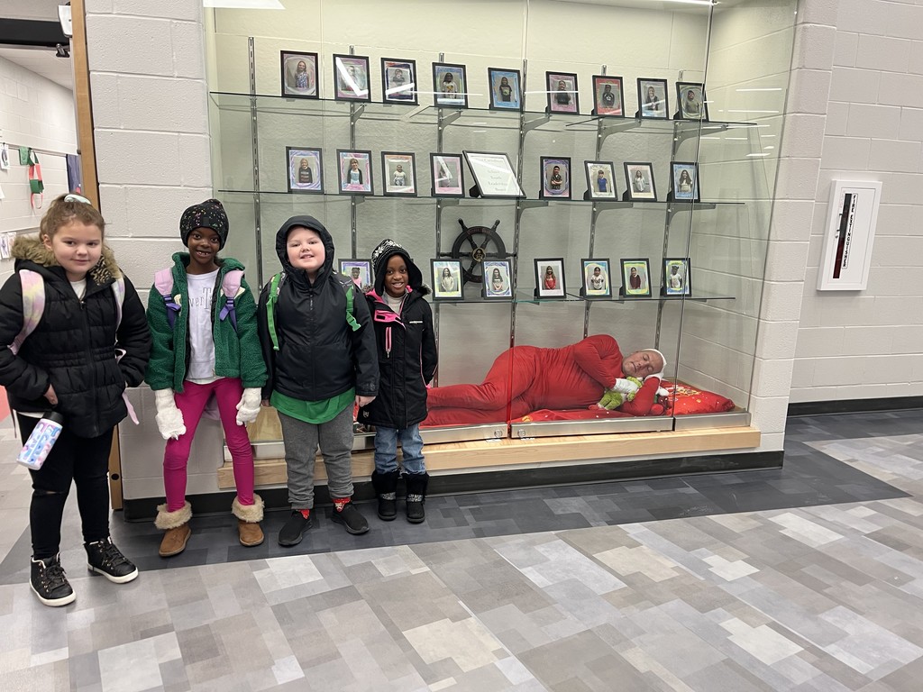 elf sleeping in the trophy case