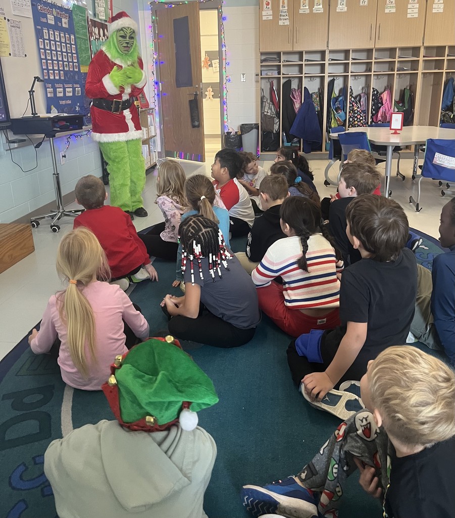 Grinch talking to students
