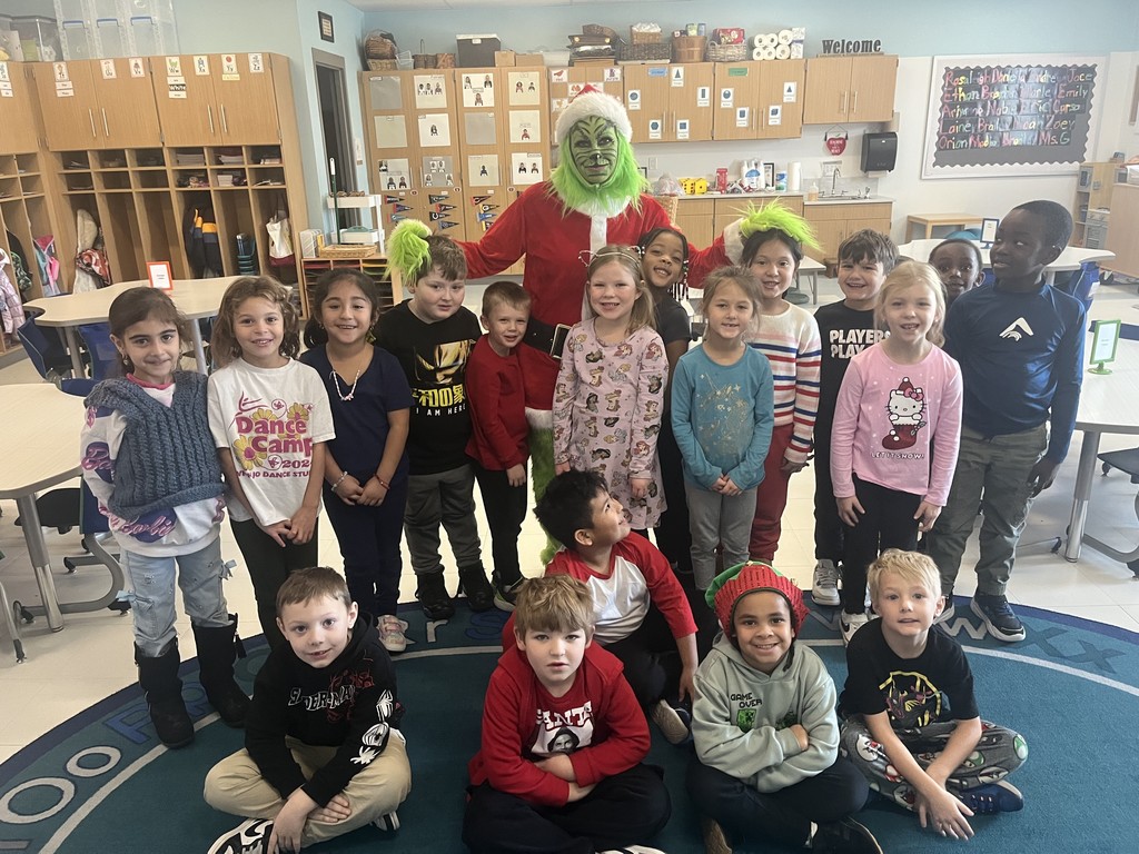 Grinch with a group of kids