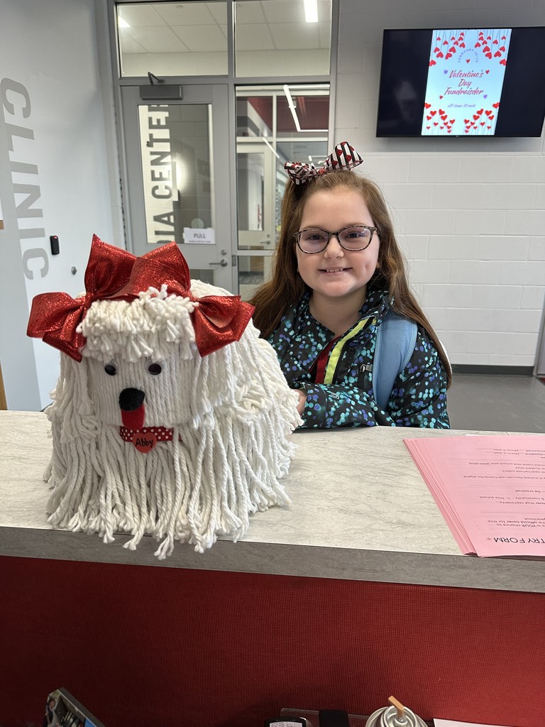 girl with valentine's day box made to look like a dog