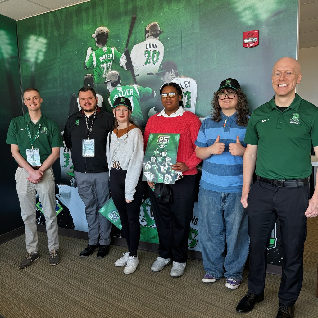 3 students with 3 members of the Dayton Dragons staff