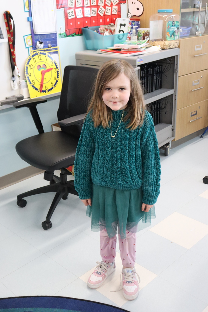 girl wearing a green dress