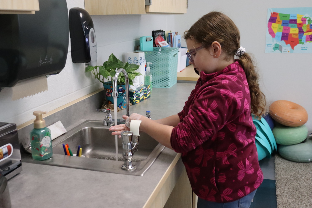 girl washing her hands