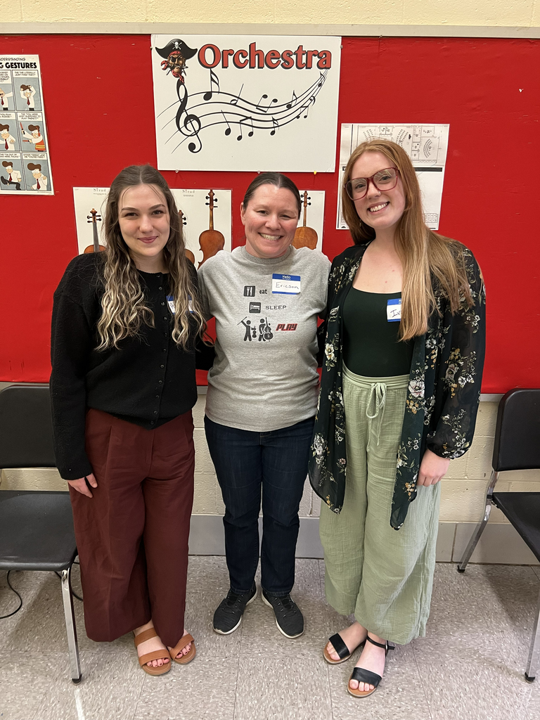 Teacher with two former students