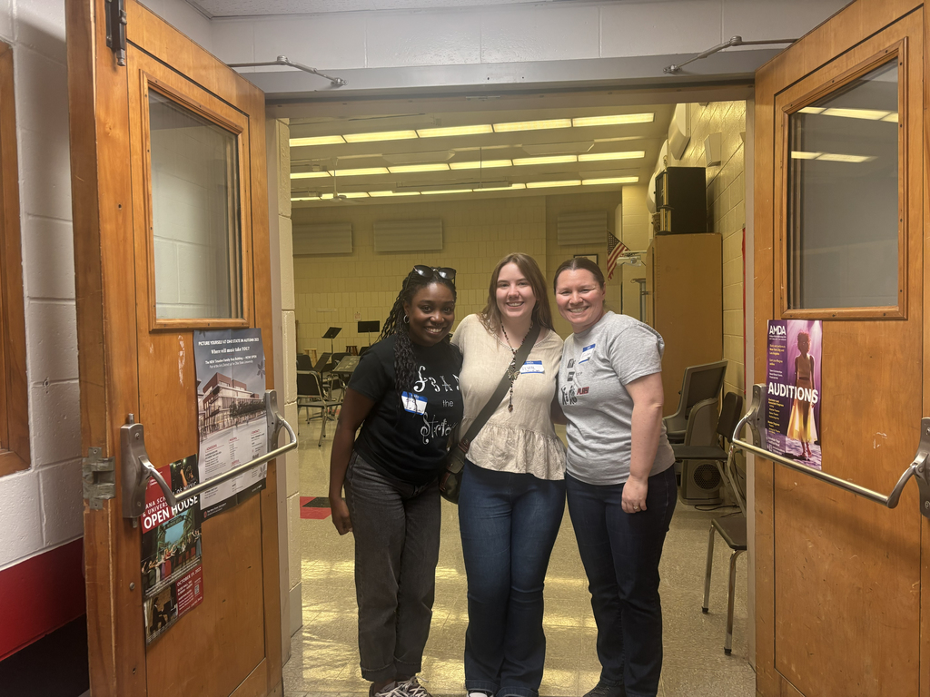 Teacher with two former students