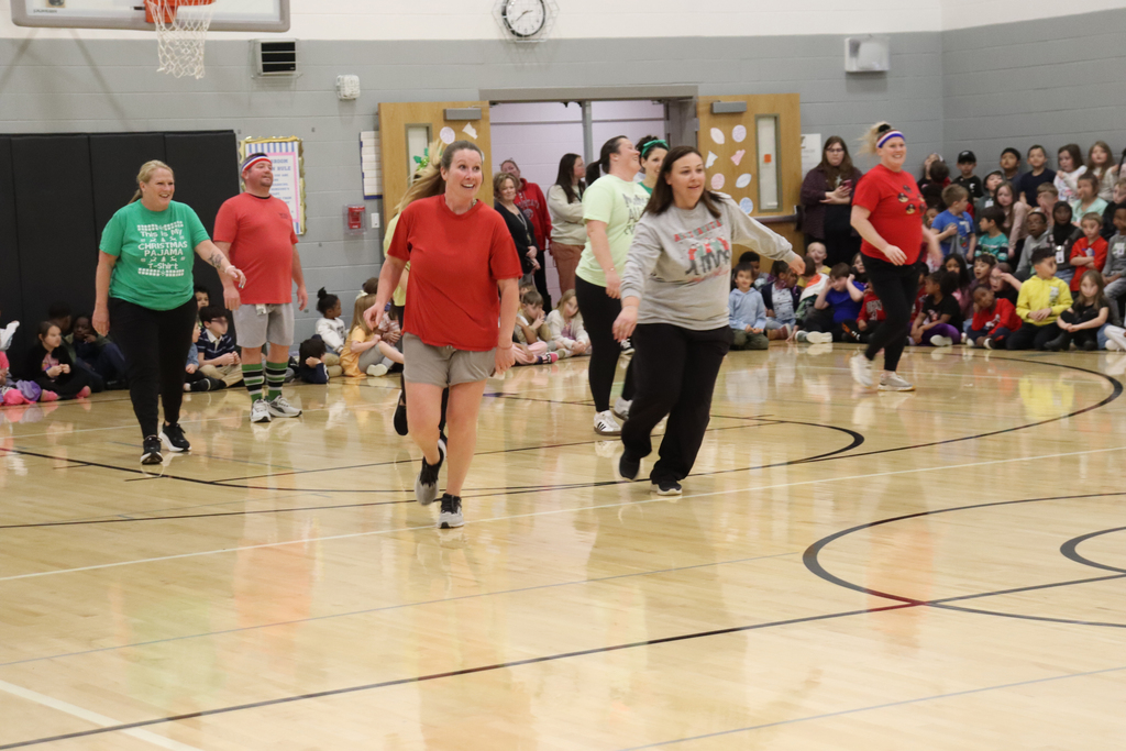 School staff playing basketball 
