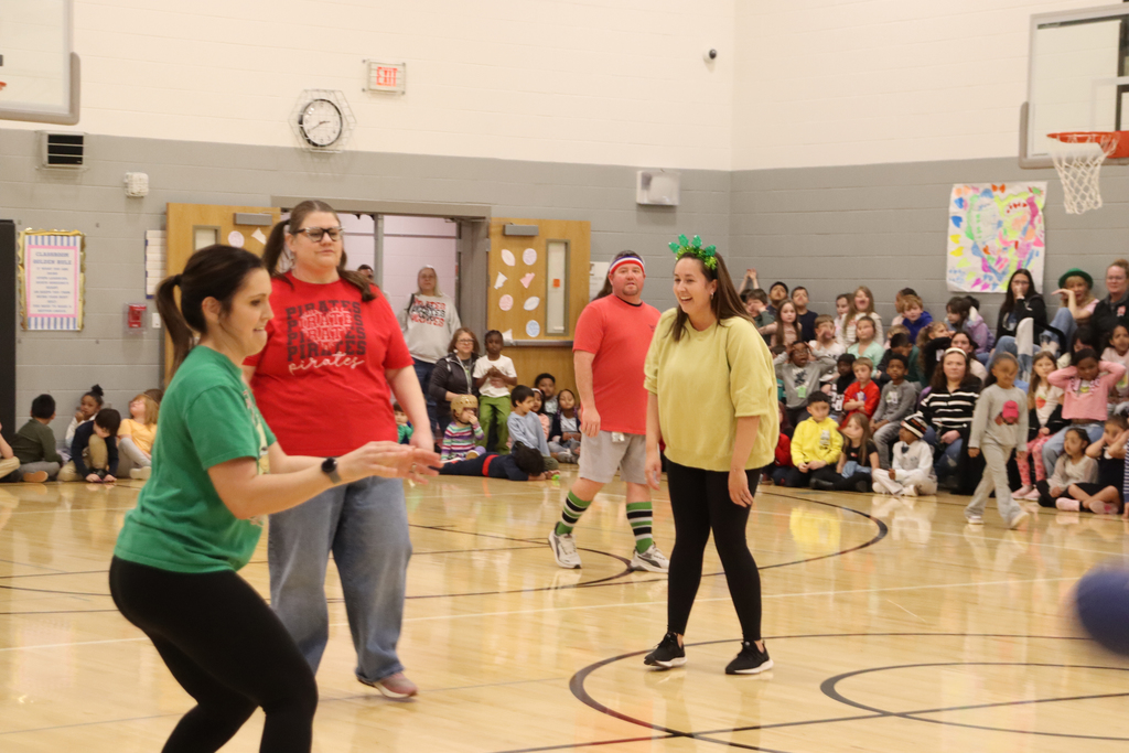 School staff playing basketball 